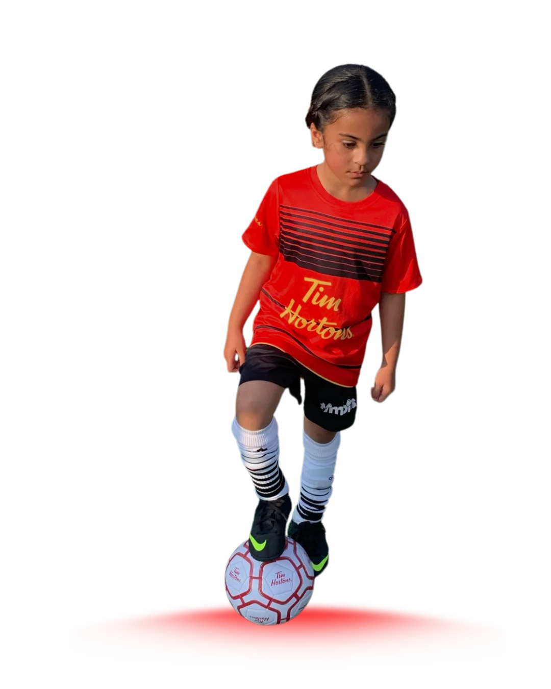 Young player with soccer ball